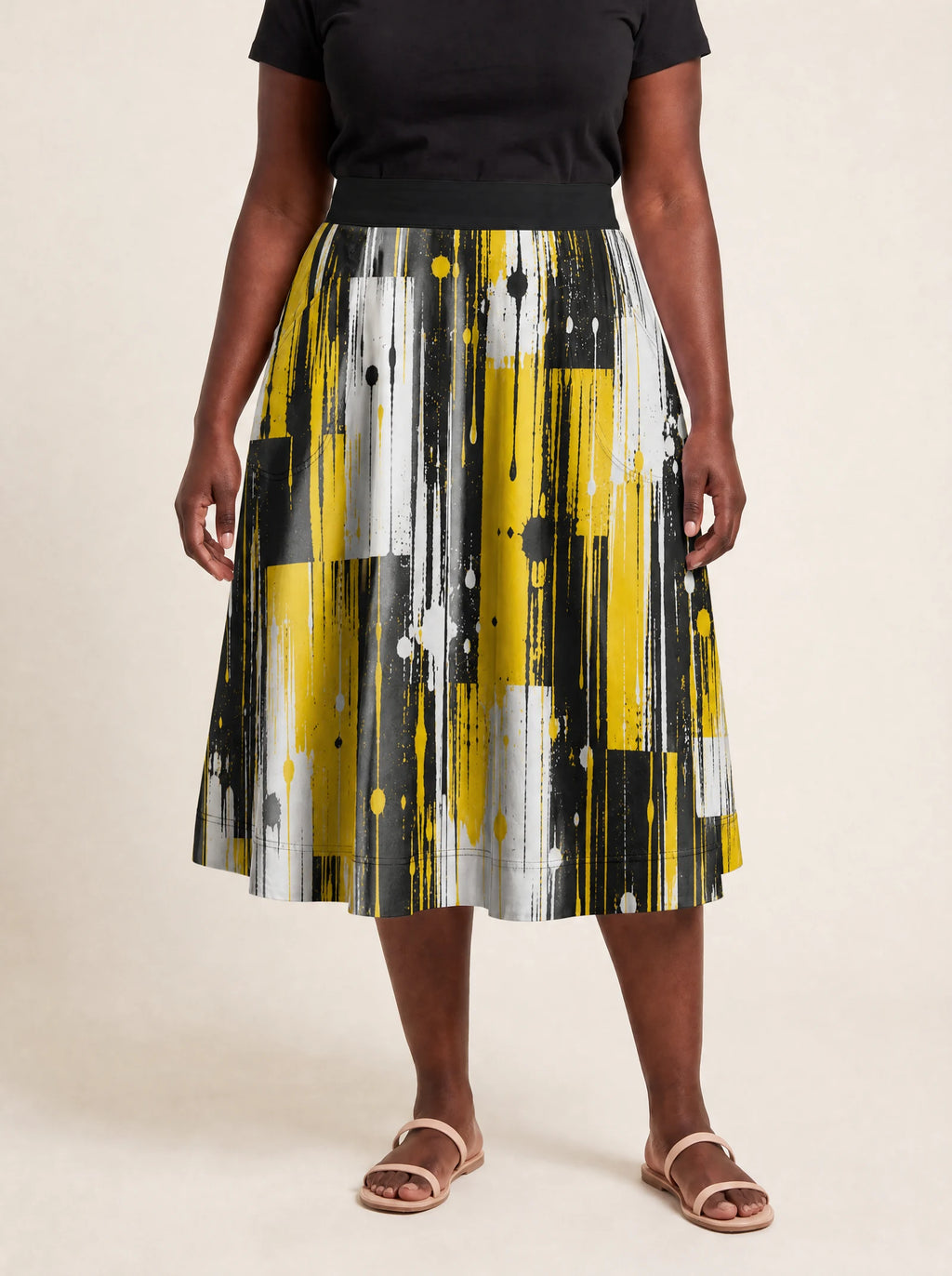 "Mvua" Twirl Skirt — cropped front view on model