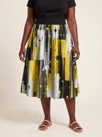 "Mvua" Twirl Skirt — cropped front view on model