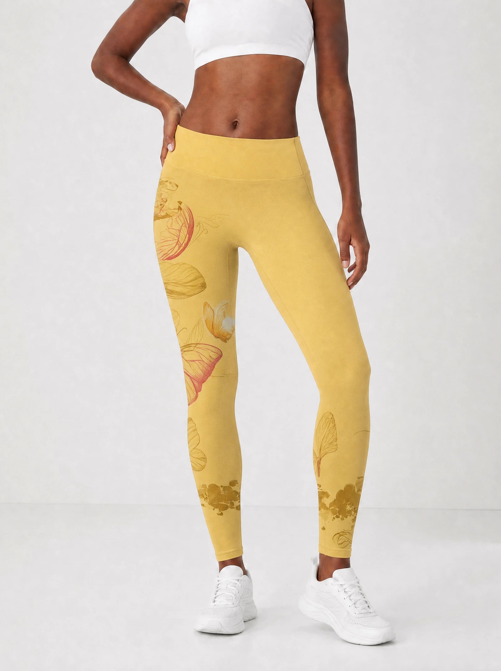 Yellow Orchid Leggings — front view on model