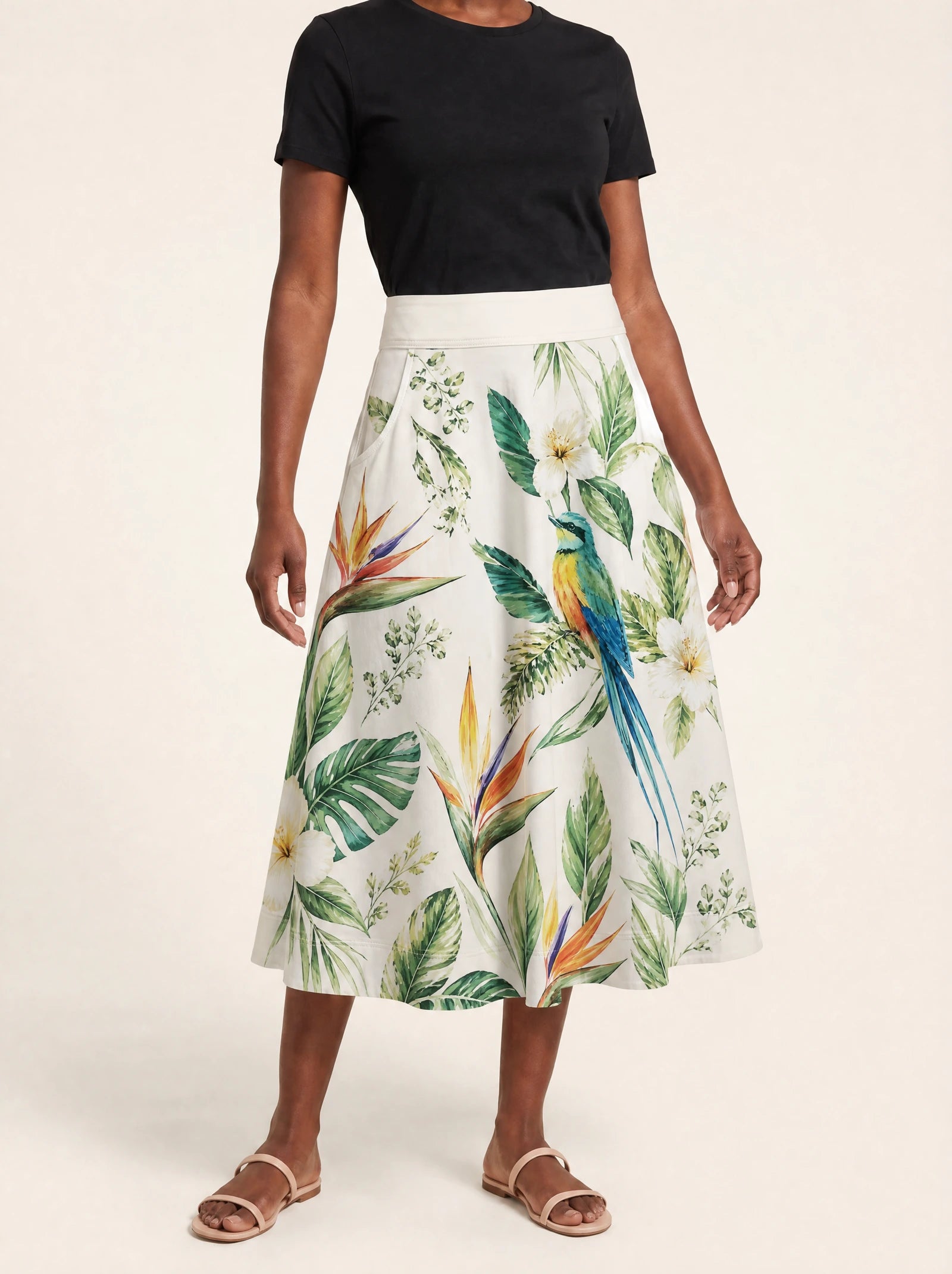 "Ndege" Twirl Skirt — cropped front view on model