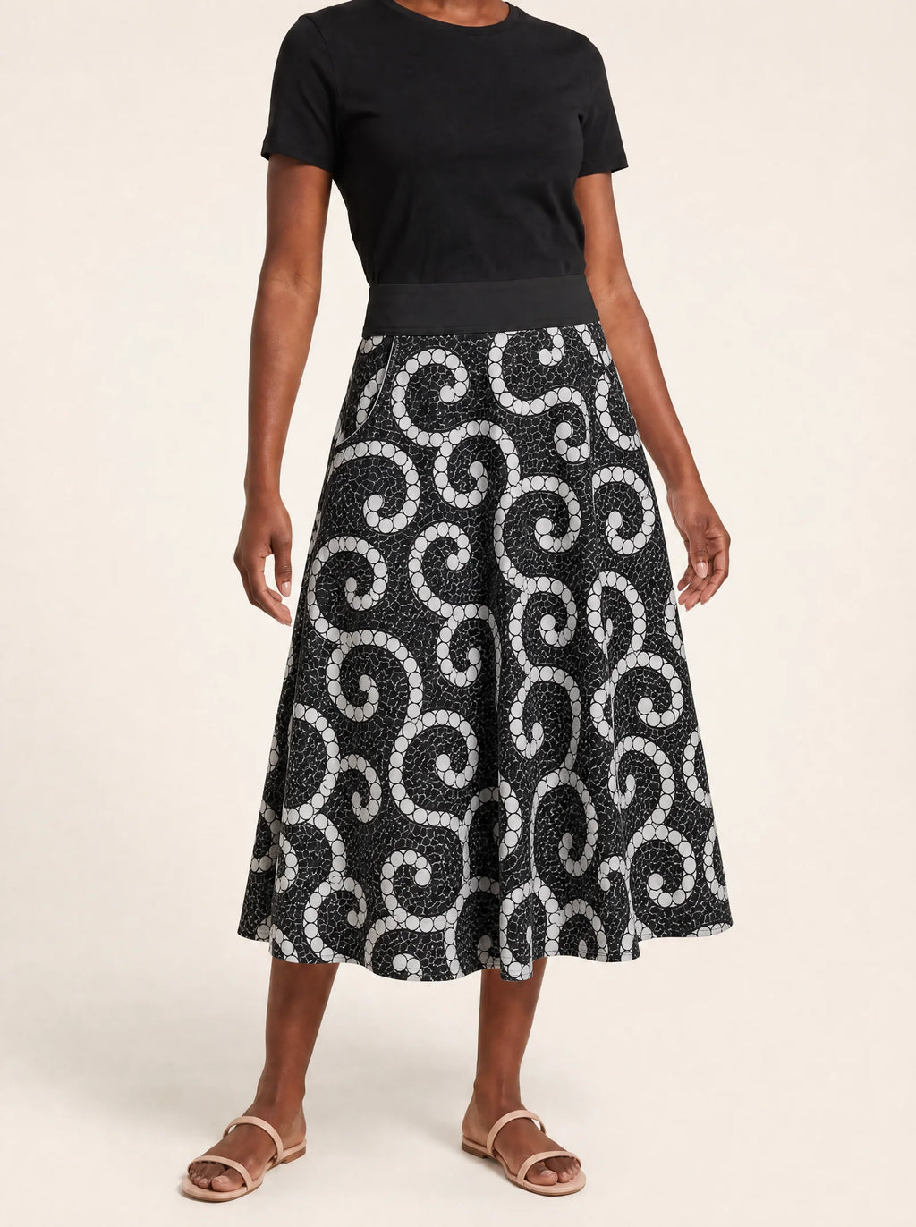 "Duara" Twirl Skirt — cropped front view on model