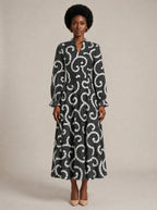 "Duara" Long Puff Sleeve Dress — front view on model