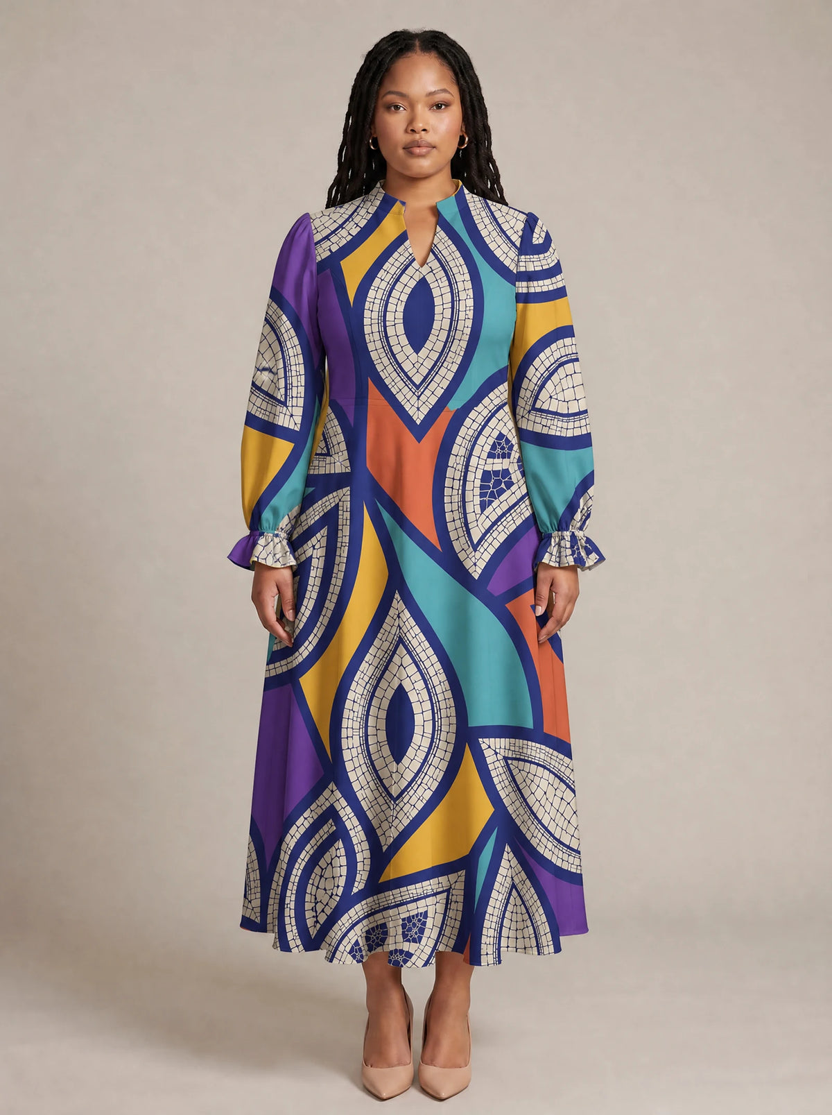 "Johari" Long Puff Sleeve Dress — front view on model