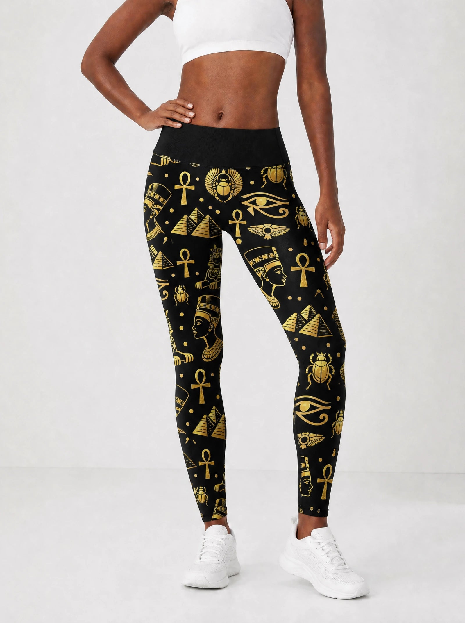 "Nefertiti" Black Gold Leggings — front view on model
