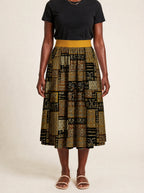 "Sankofa" Twirl Skirt — cropped front view on model