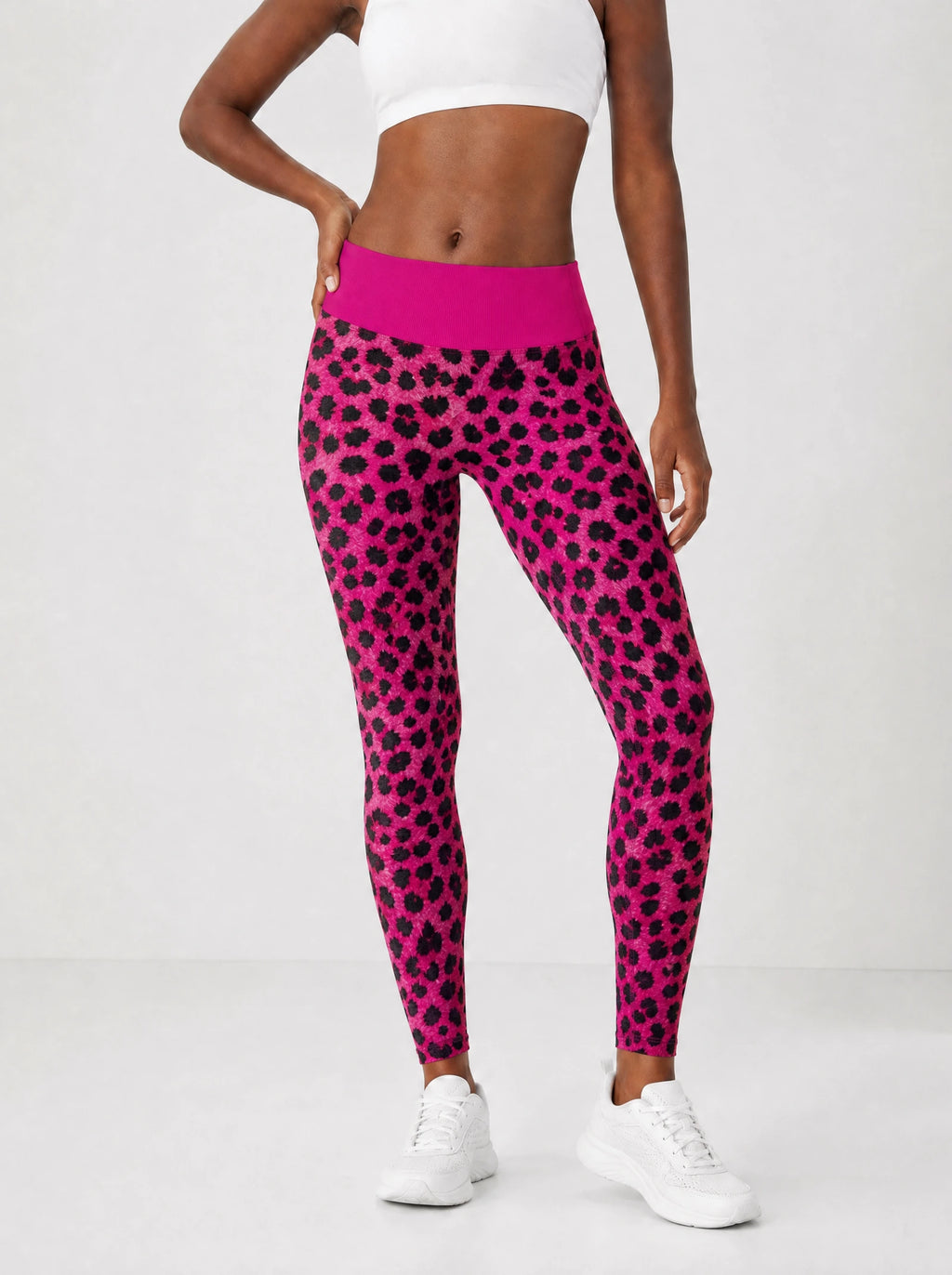 "Unstoppable" Pink Leopard Leggings — front view on model