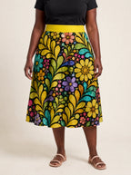 "Njano" Twirl Skirt — front view on model