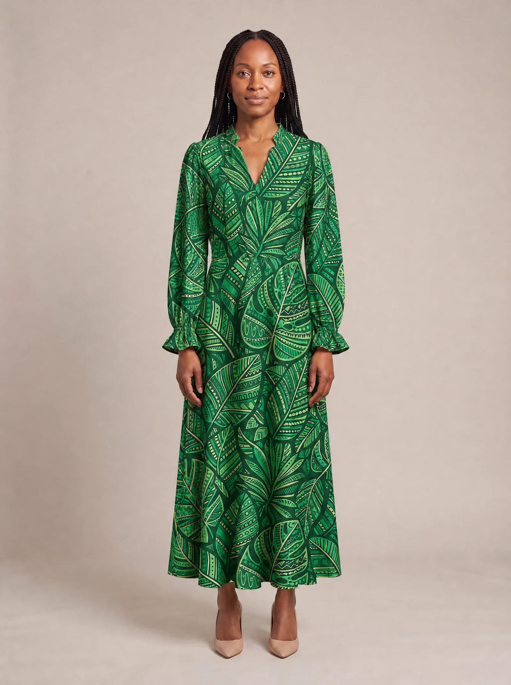 "Asili" Emerald Long Puff Sleeve Dress — front view on model