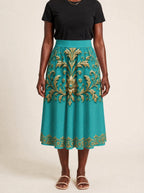 "Heshima" Twirl Skirt — front view on model
