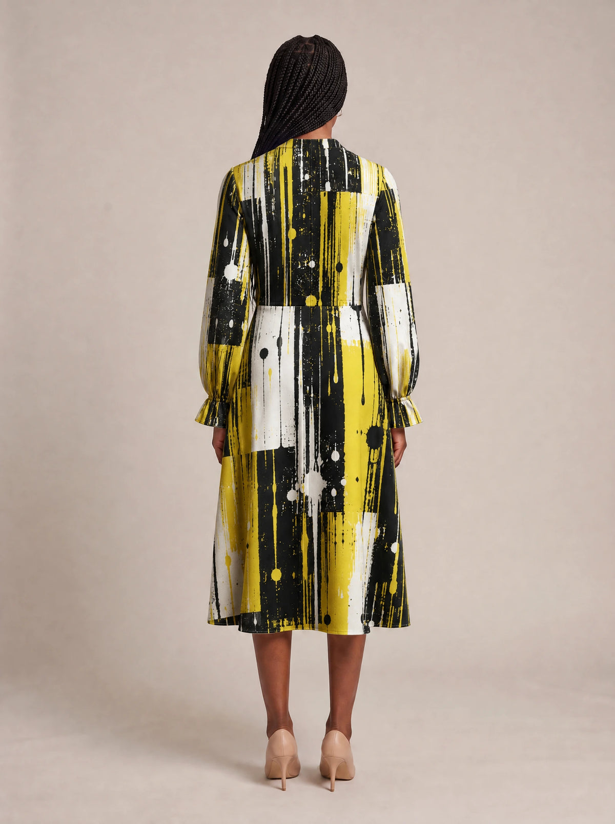 "Mvua" Long Puff Sleeve Dress — back view on model