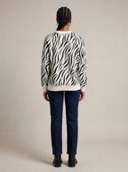 "Milia" Sweatshirt — back view on model