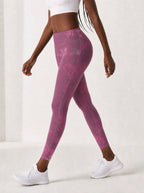 Pink Orchid Leggings — side view on model