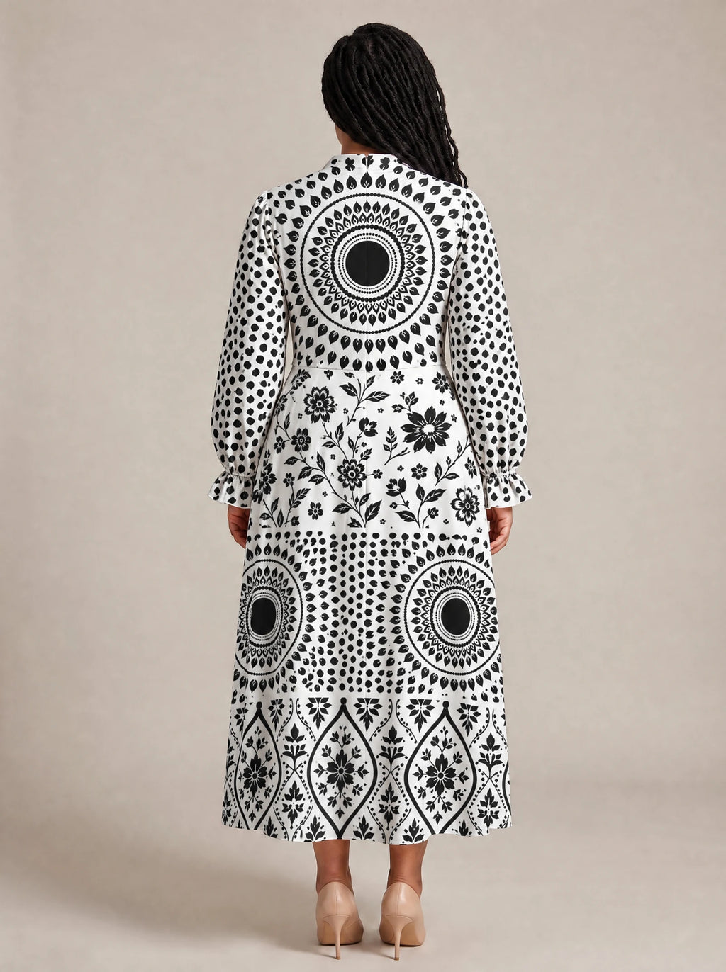 "Mwanga" Long Puff Sleeve Dress — back view on model
