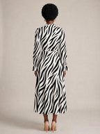 "Milia" Long Puff Sleeve Dress — back view on model