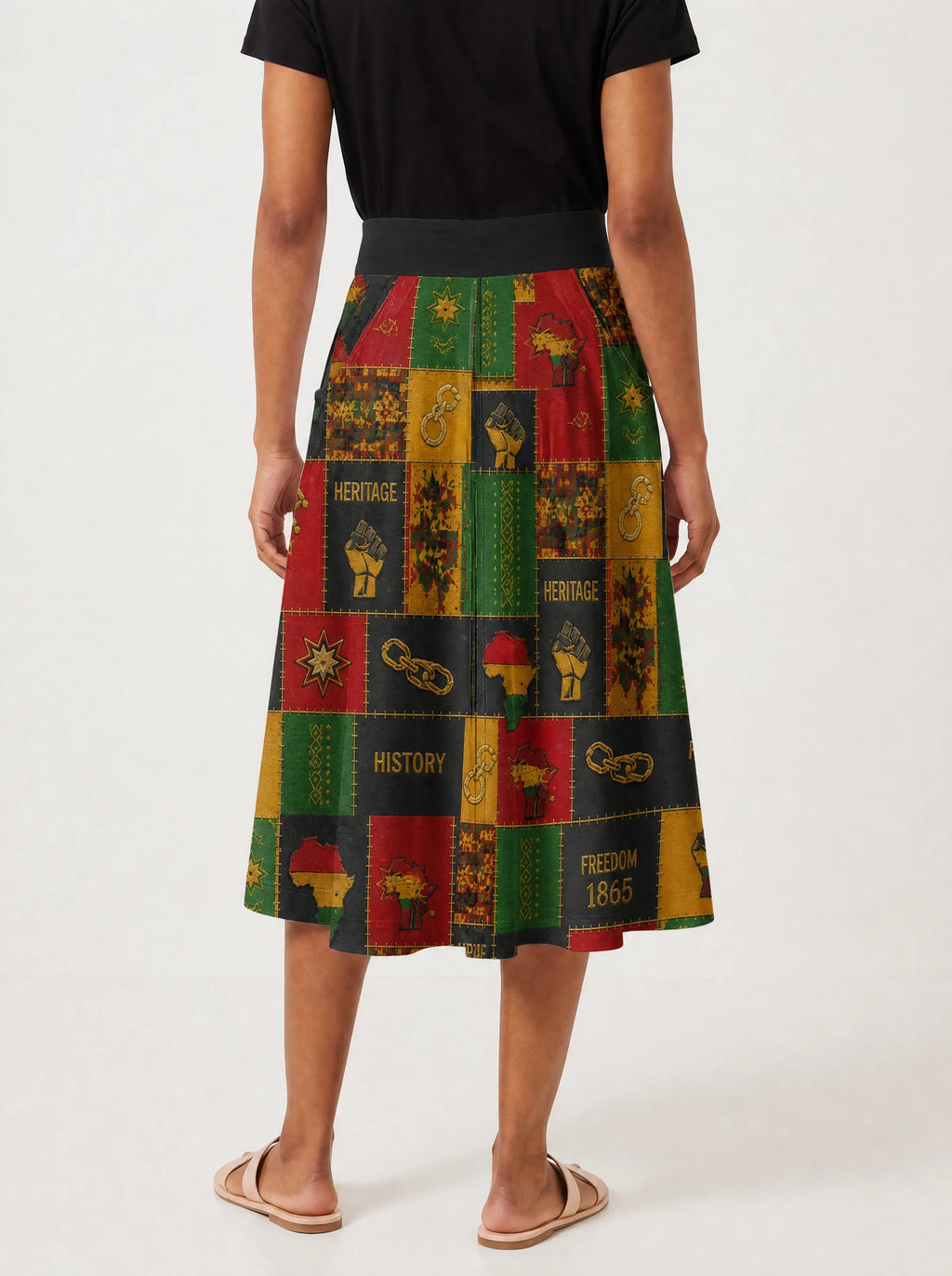 "Kumbuka" Twirl Skirt — cropped back view on model