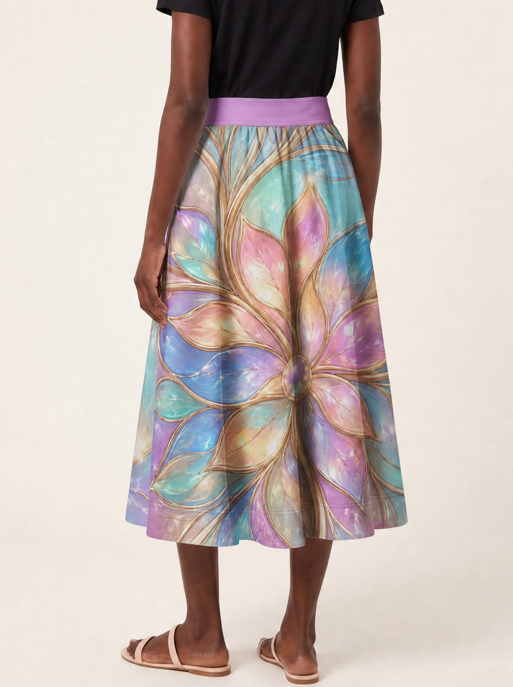 "Almasi" Twirl Skirt — cropped back view on model