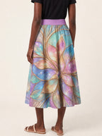 "Almasi" Twirl Skirt — cropped back view on model