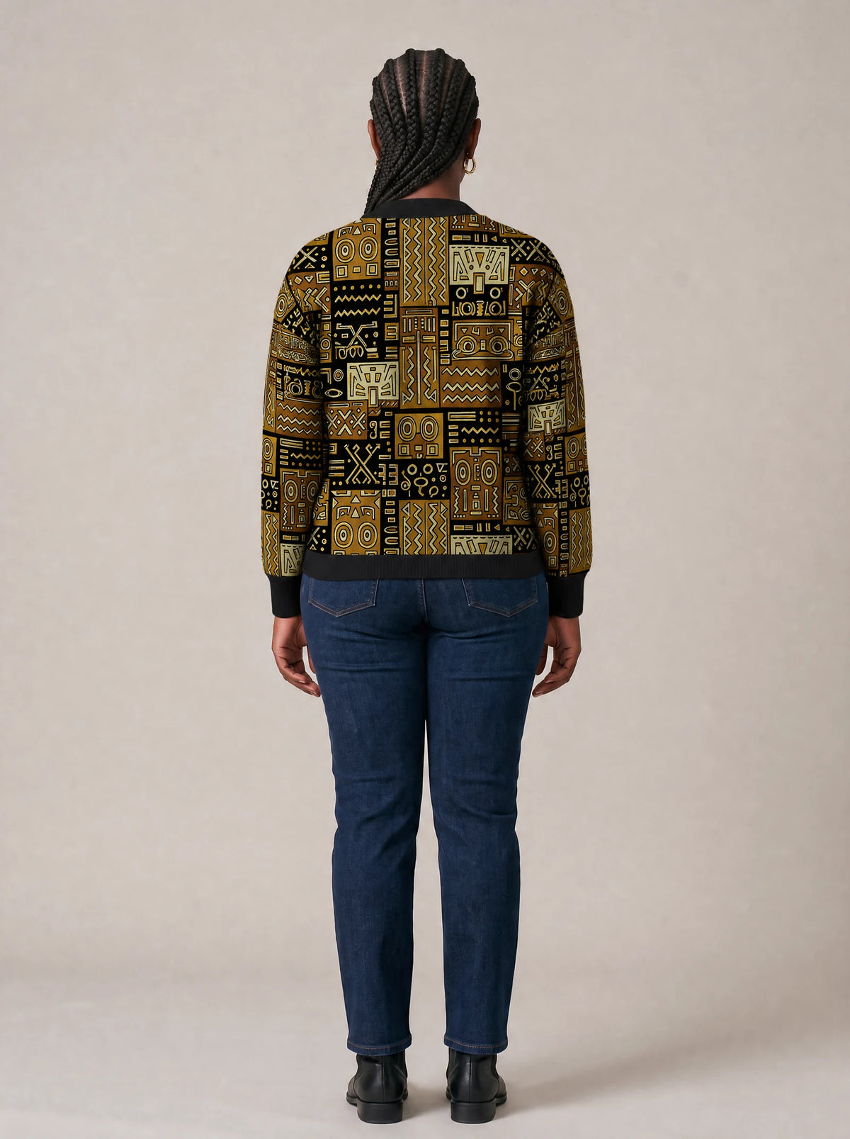 "Sankofa" Knitted Cardigan — back view on model