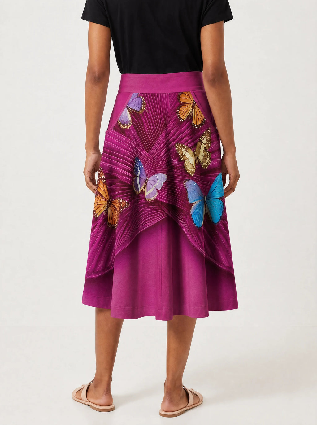 "Kipepeo" Twirl Skirt — back view on model