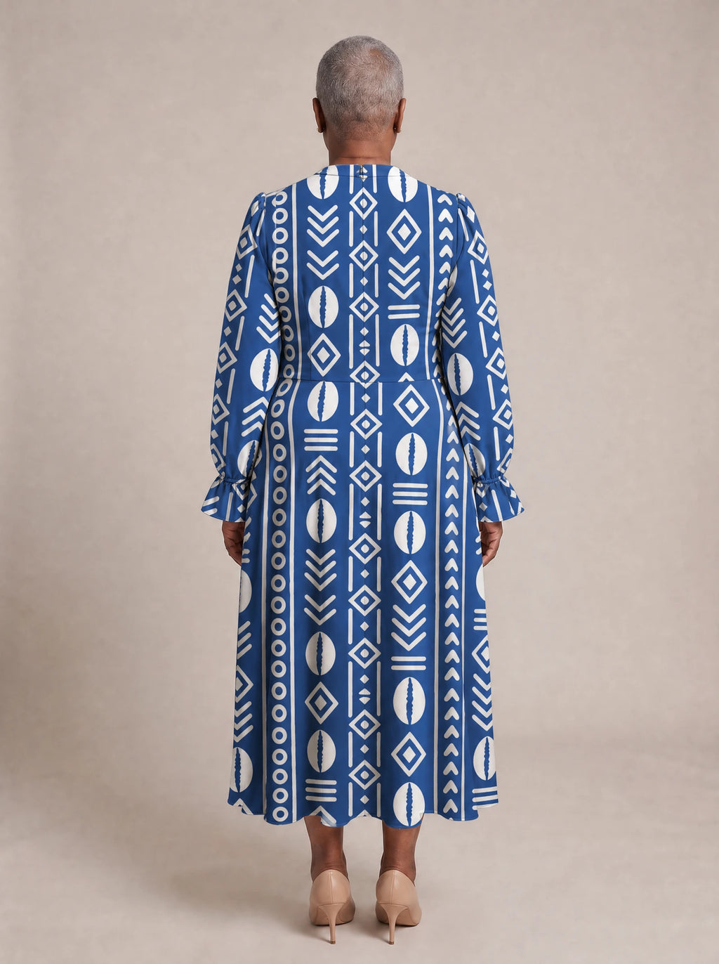 "Oshun" Royal Blue Long Puff Sleeve Dress — back view on model