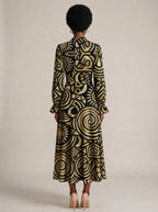 "Sahara" Long Puff Sleeve Dress — back view on model