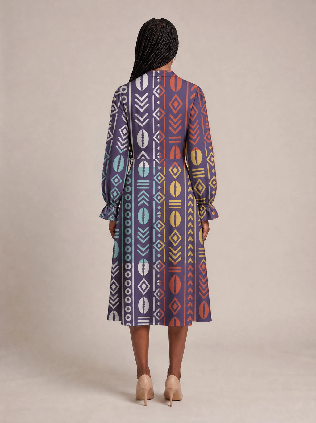 "Oshun Zamani" Long Puff Sleeve Dress — back view on model