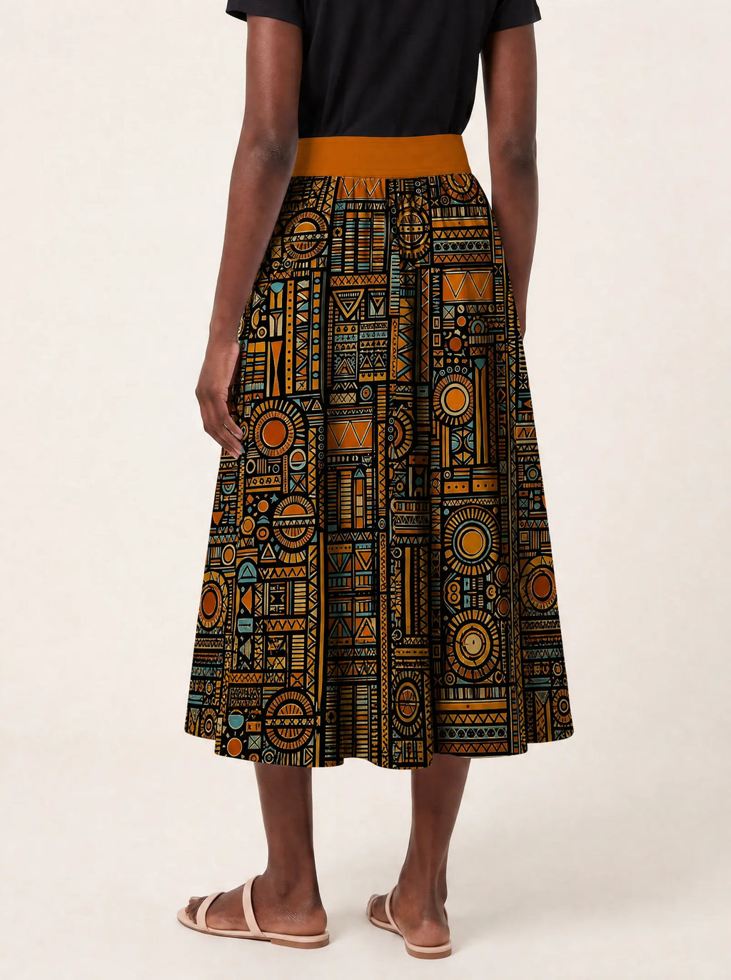 "Afrocentric Pattern" Twirl Skirt — cropped back view on model