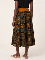 "Afrocentric Pattern" Twirl Skirt — cropped back view on model