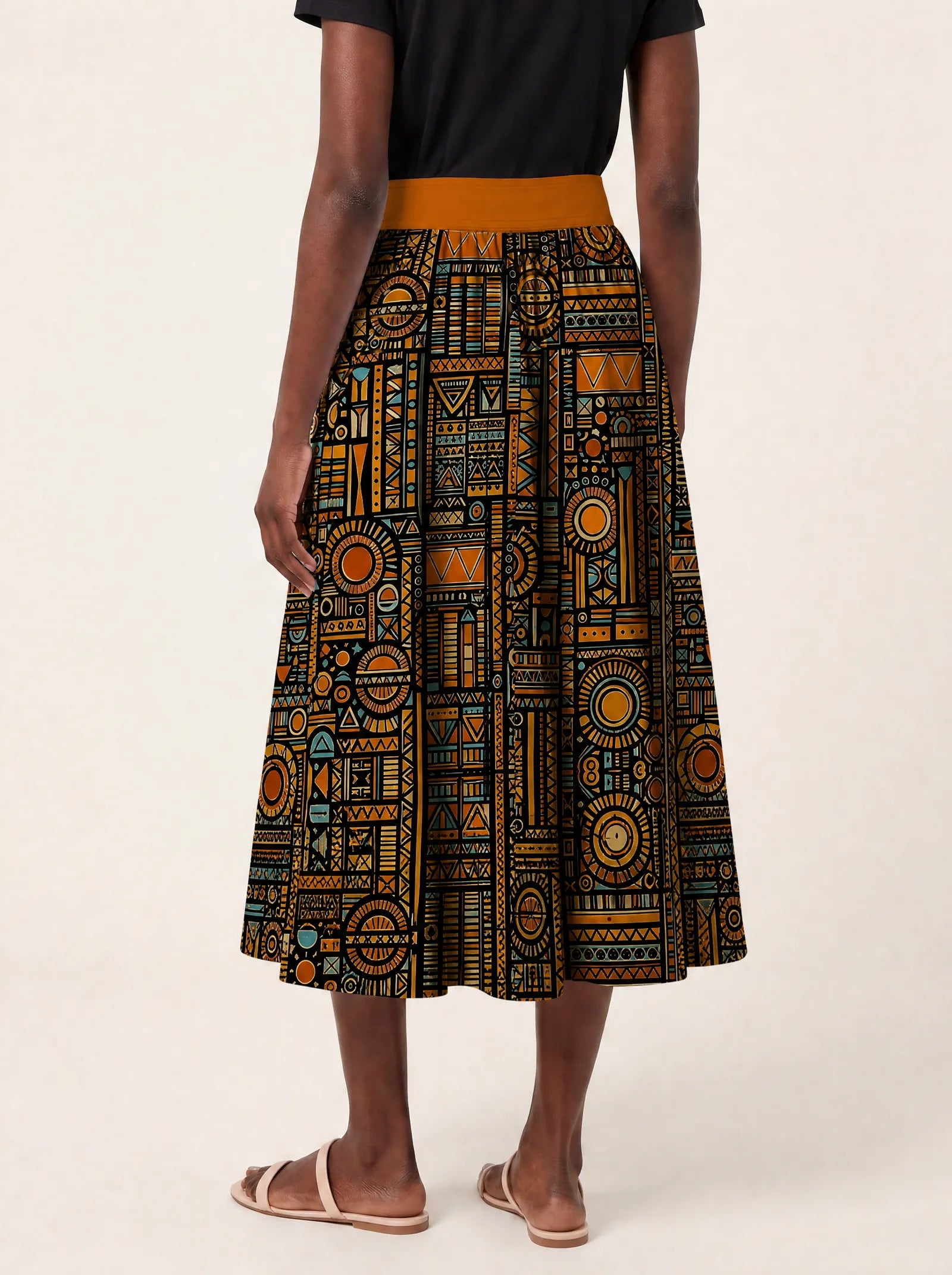 "Afrocentric Pattern" Twirl Skirt — cropped back view on model