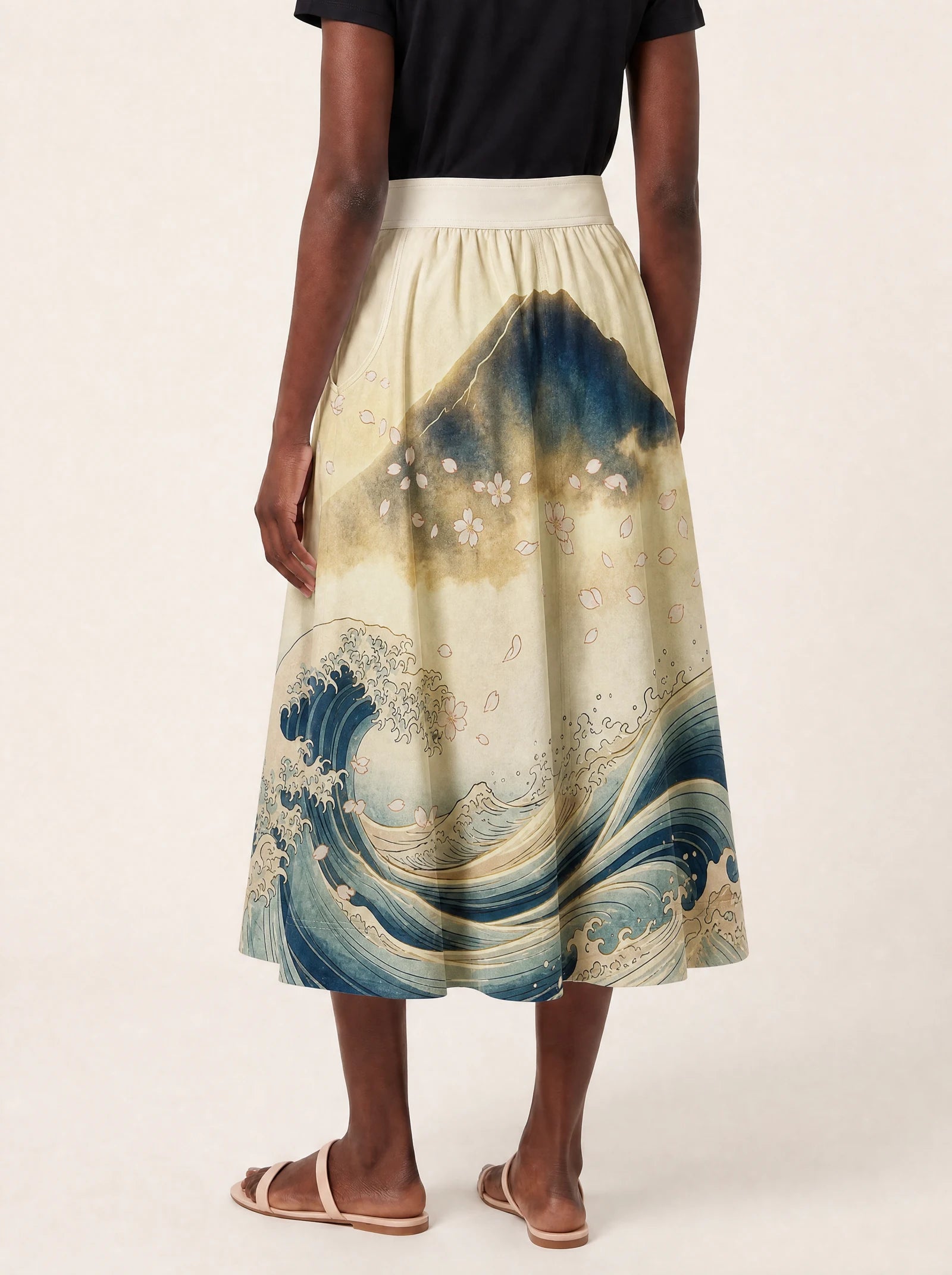 "Wimbi" Twirl Skirt — cropped back view on model
