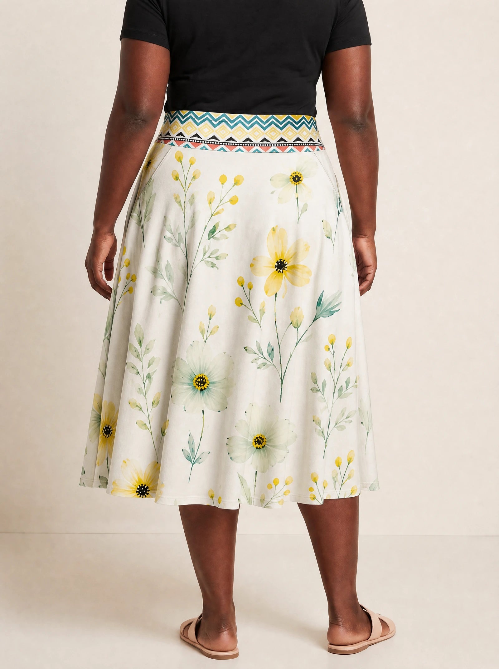 "Alizeti" Twirl Skirt — cropped back view on model