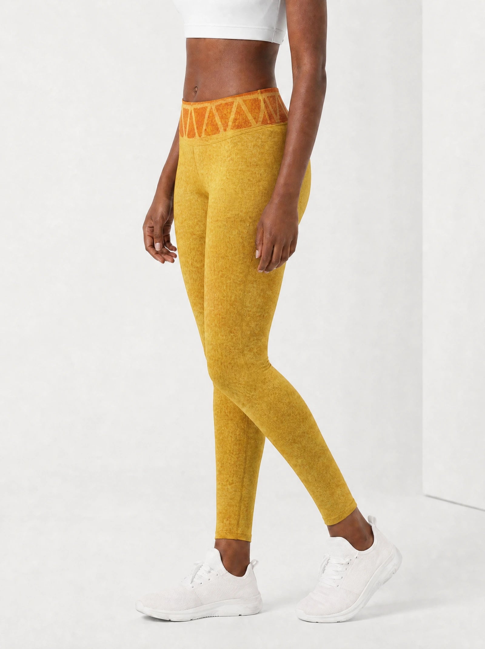 Black Excellence Leggings — side view on model