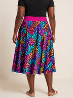 "Rangi" Twirl Skirt — cropped back view on model