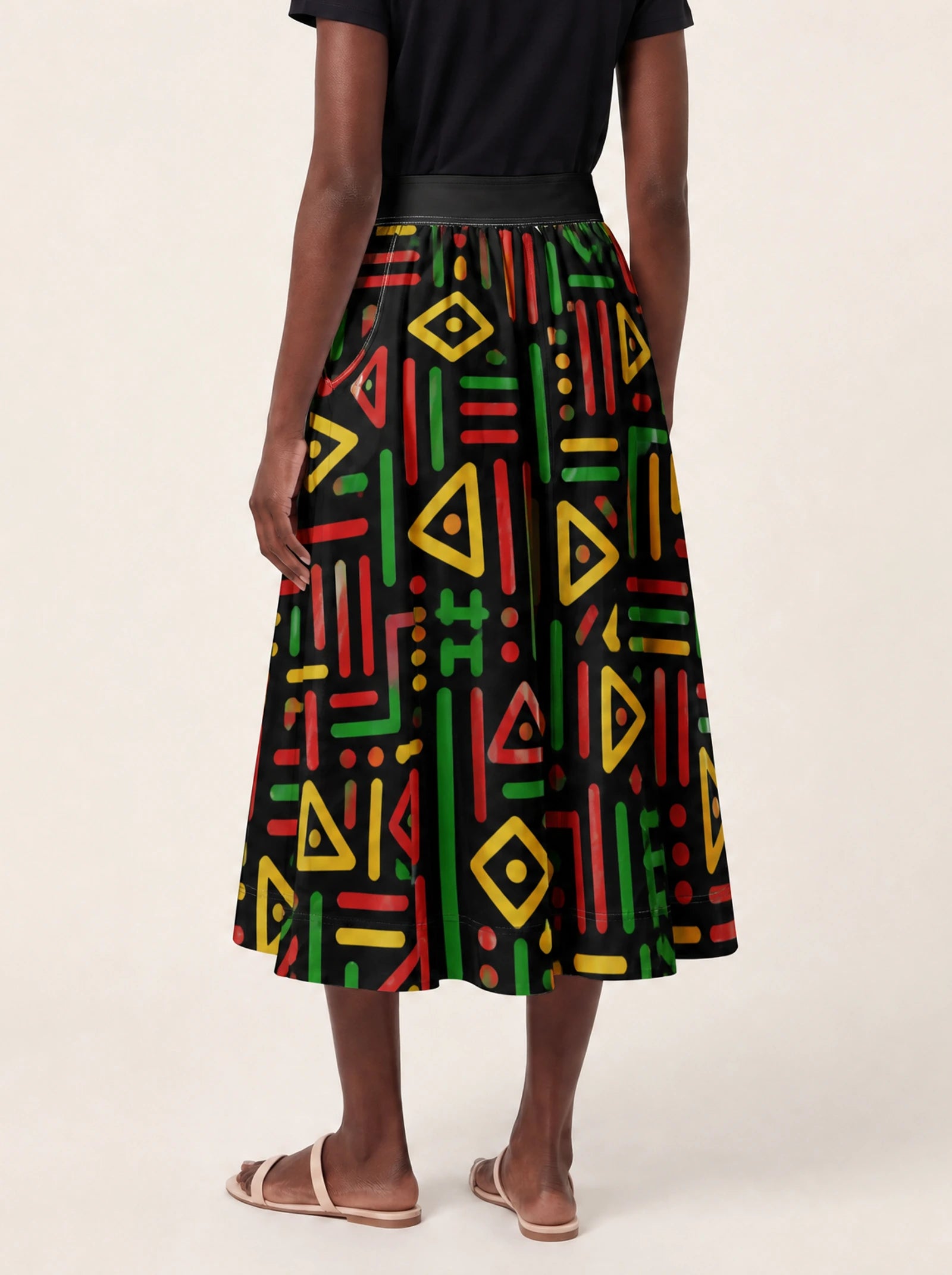 "Nairobi" Twirl Skirt — cropped back view on model