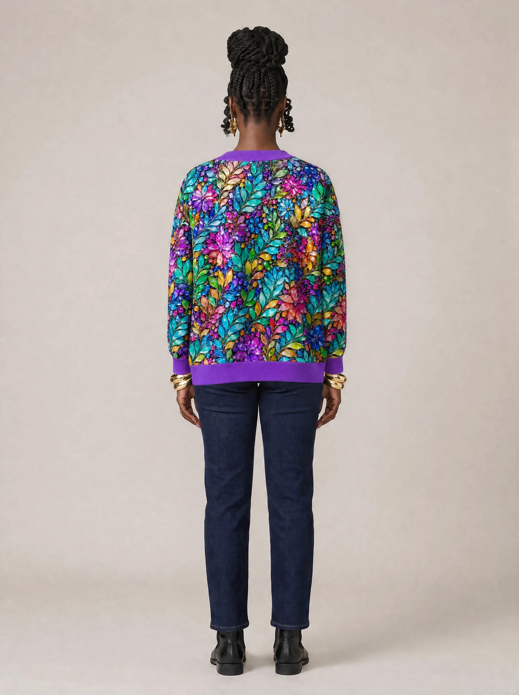 "Upinde" Cardigan — back view on model