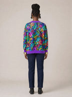 "Upinde" Cardigan — back view on model