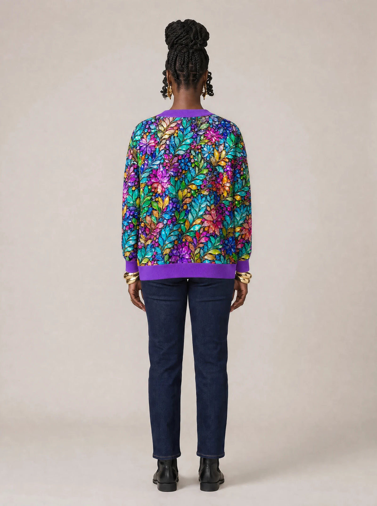 "Upinde" Cardigan — back view on model