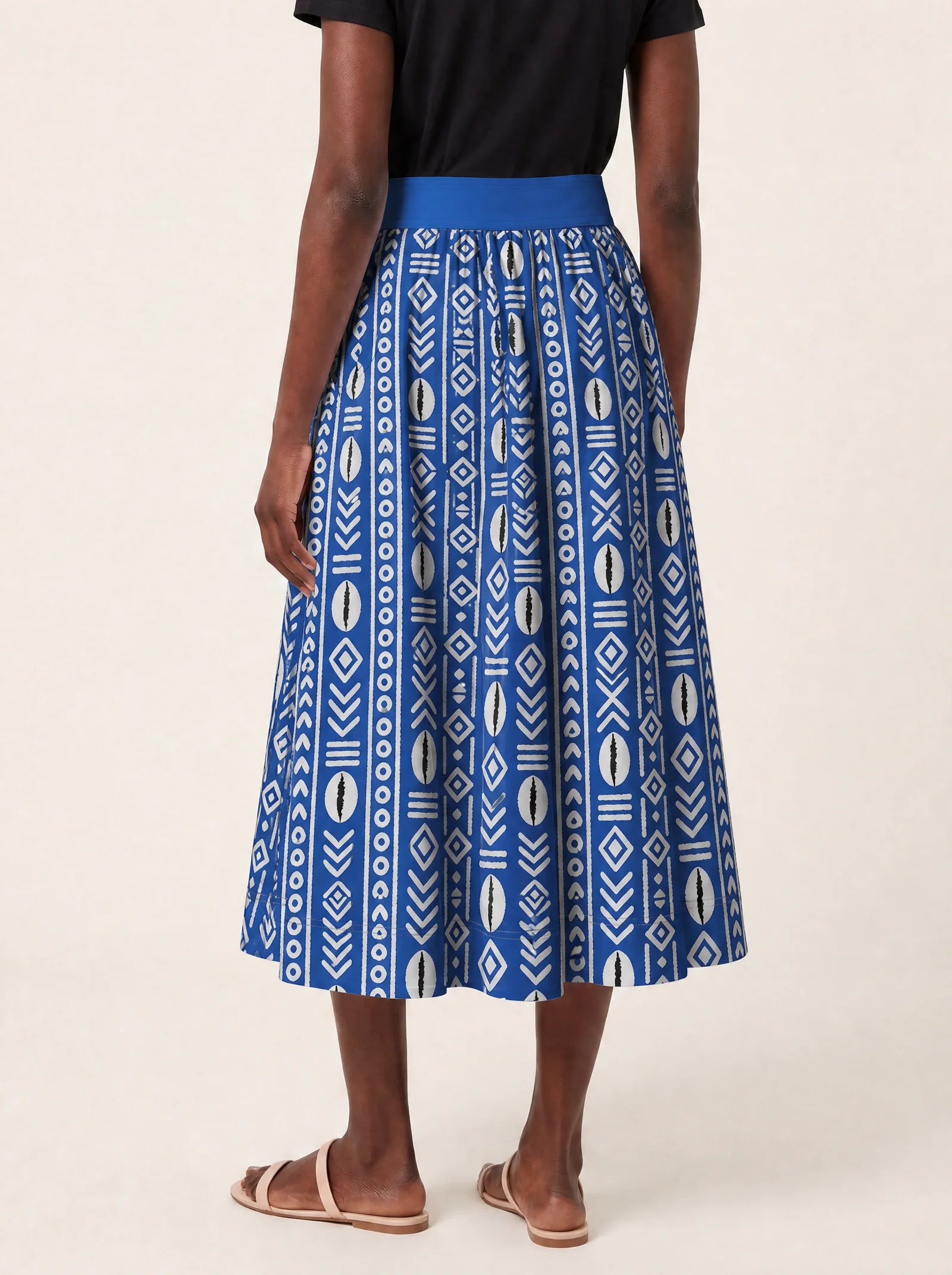 "Oshun Royal Blue" Twirl Skirt — cropped back view on model