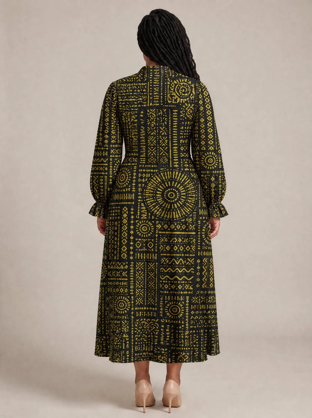 "Lamu" Long Puff Sleeve Dress — back view on model