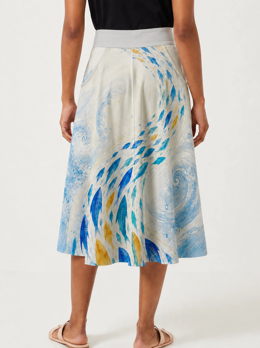 "Samaki" Twirl Skirt — cropped back view on model