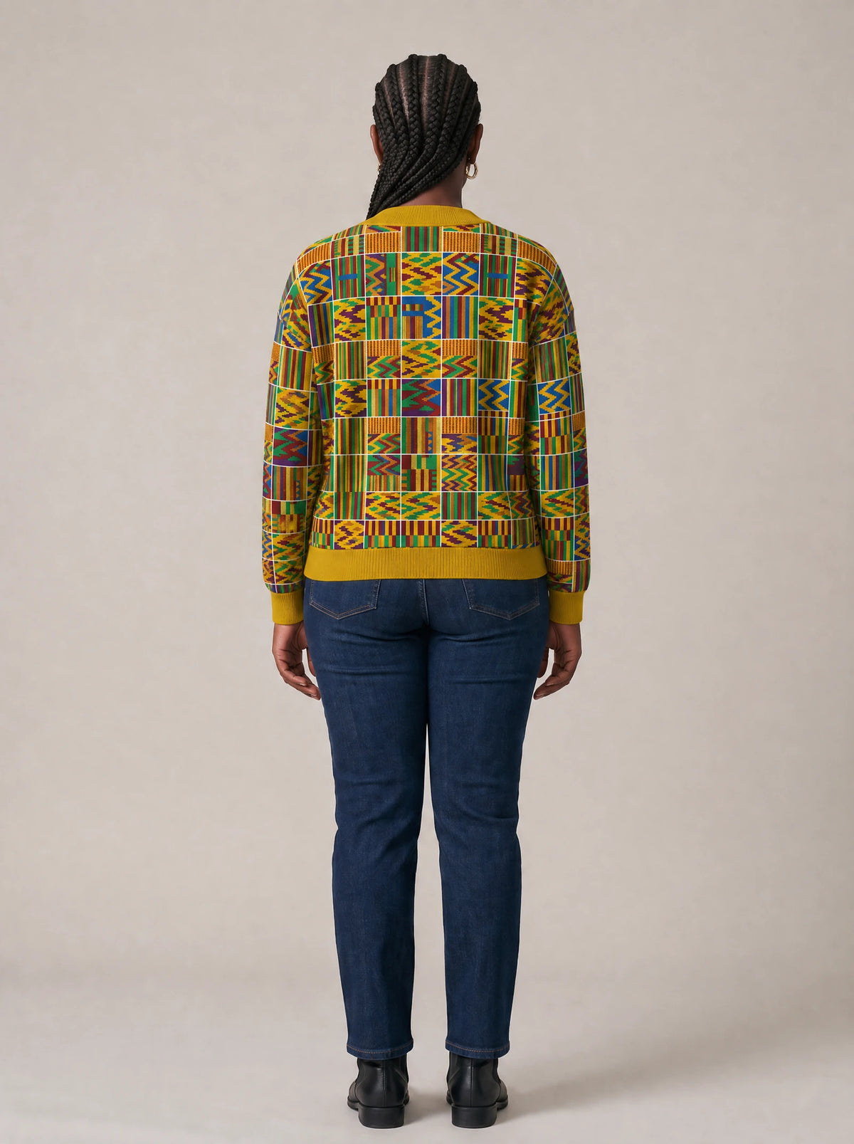 "Shangwe" Cardigan — back view on model
