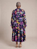 "Njozi" Long Puff Sleeve Dress — back view on model