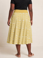 "Oshun Dhahabu" Twirl Skirt — cropped back view on model