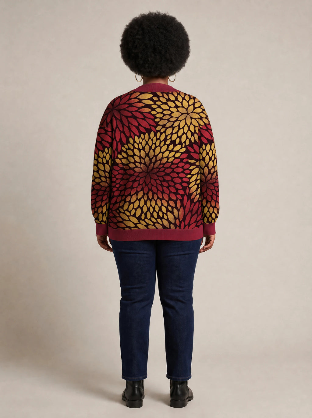 "Mavuno" Knitted Cardigan — back view on model