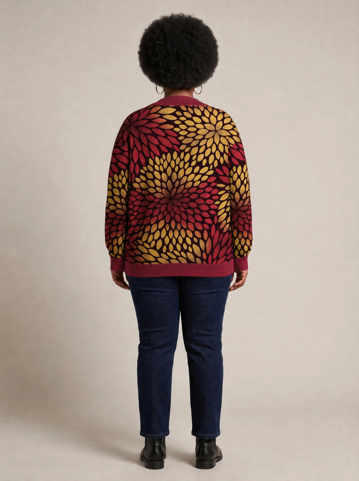 "Mavuno" Knitted Cardigan — back view on model