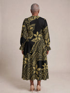 "Pualani" Long Puff Sleeve Dress — back view on model