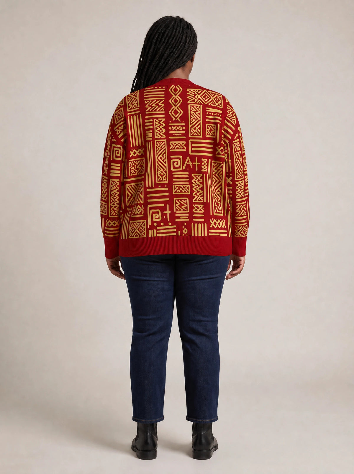 "Alama" Knitted Cardigan — back view on model