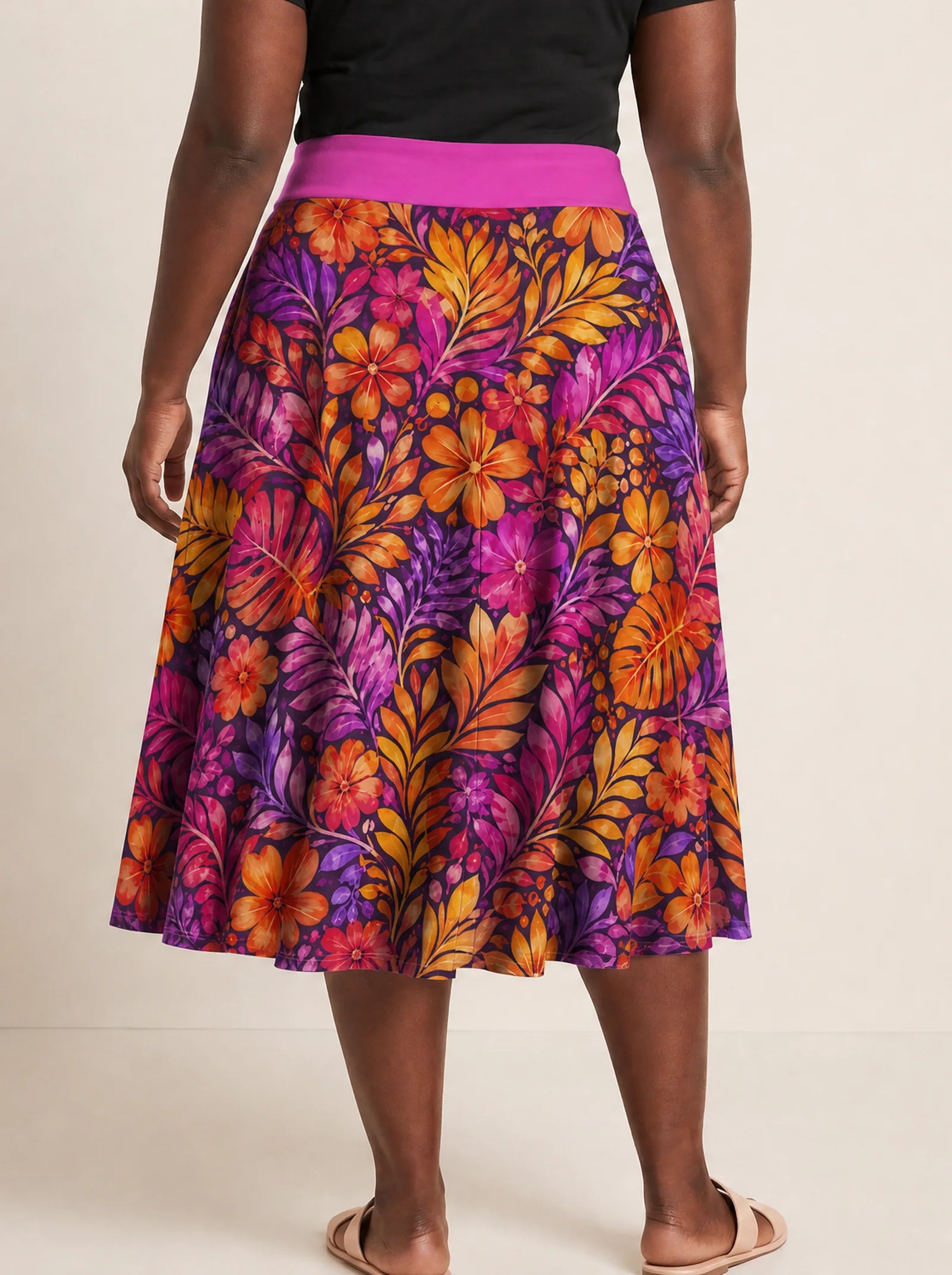 "Waridi" Twirl Skirt — cropped back view on model