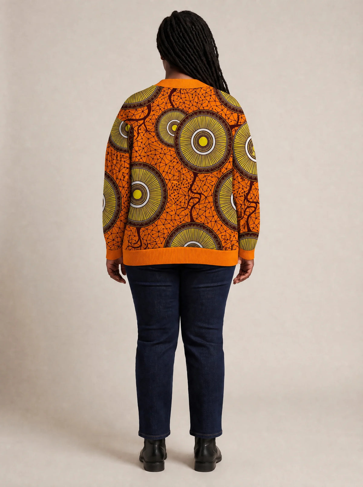 "Mchana" Cardigan — back view on model