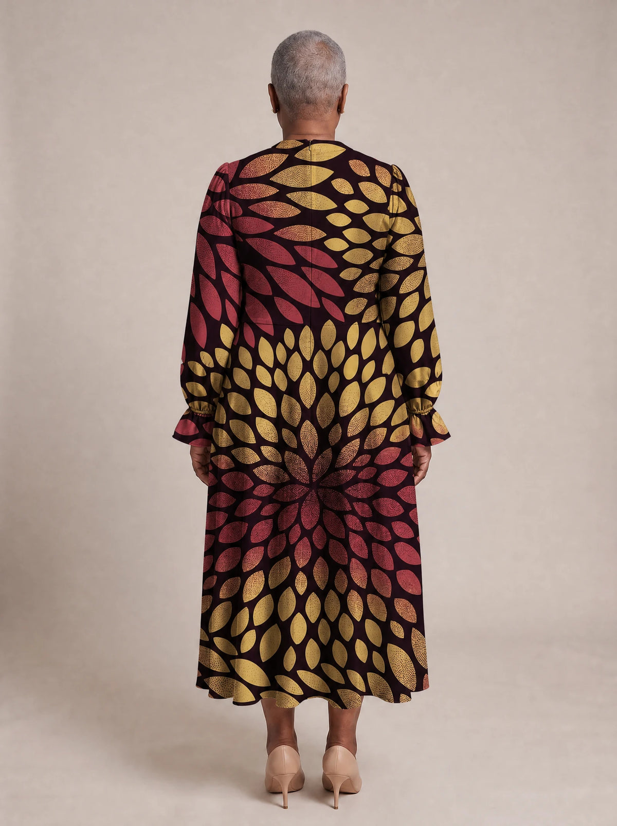 "Mavuno" Long Puff Sleeve Dress — back view on model